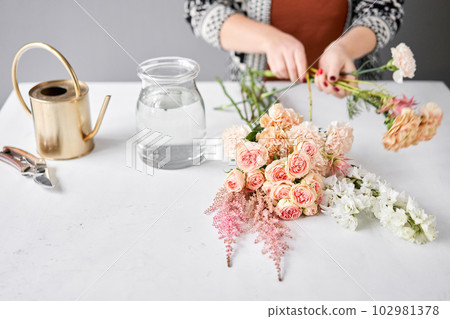 Step by step installation of flowers in a vase. Flowers bunch, set for home. Fresh cut flowers for decoration home. European floral shop. Delivery fresh cut flower. Step by step installation of flowers in a vase. Flowers bunch, set for home. Fresh cut flowers for decoration home. European floral shop. Delivery fresh cut flower. 102981378