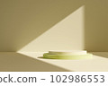 Cylinder abstract minimal scene with geometric platform on wall background with light streaks from the window. Space to show cosmetic products. 3d rendering 102986553