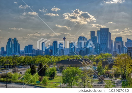 A Calgary Downtown skyline during the spring with some dramatic clouds. 102987080