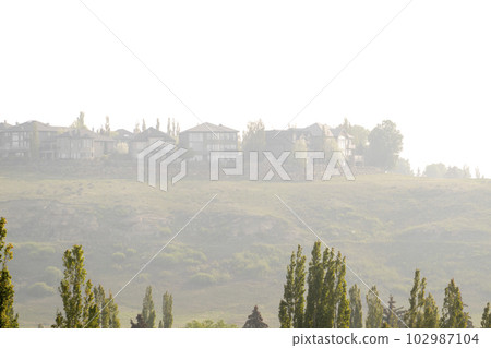 Calgary, Alberta, Canada. May 18, 2023. Panorama hills neighbourhood with poor quality air due to wildfires in Alberta and British Columbia. 102987104