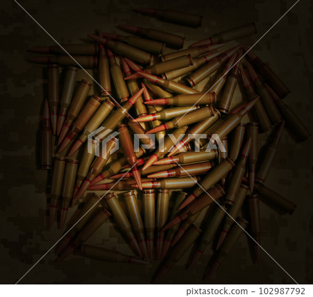 Heap of billets. Ammunition lies in heap. War Concept. Military concept Heap of billets. Ammunition lies in heap. War Concept. Military concept 102987792