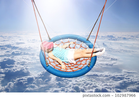 Flight over clouds. Wonderful panorama from window of plane with white clouds 102987966