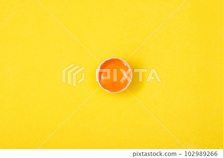 Top view egg yolk and egg white high protein good for body yellow background. Top view egg yolk and egg white high protein good for body yellow background. 102989266