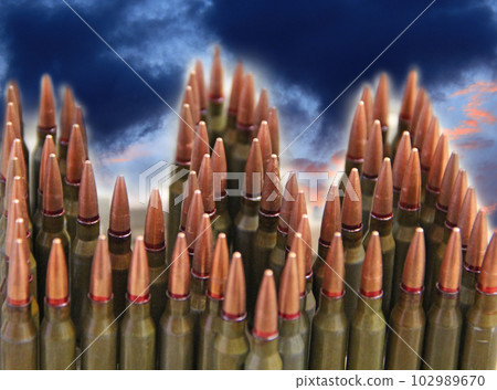 coat of arms of Ukraine made from cartridges against dark sky. Ukrainian fight 102989670