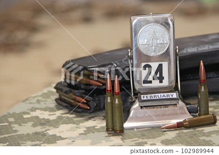 russian-Ukrainian war on 24 of February 2022. War Concept. Pile of bullets russian-Ukrainian war on 24 of February 2022. War Concept. Pile of bullets 102989944