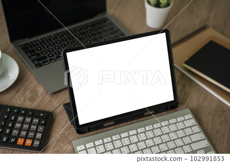 Laptop with blank screen on table. Workspace background new project on laptop computer with blank copy space screen for your advertising text message Laptop with blank screen on table. Workspace background new project on laptop computer with blank copy space screen for your advertising text message 102991853