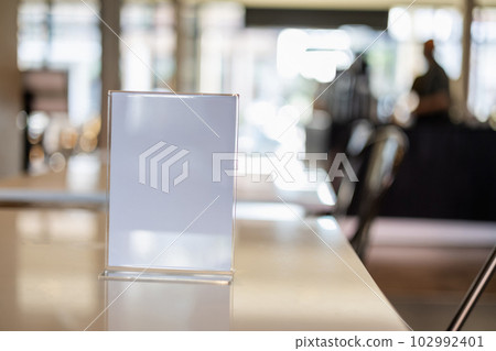 Stand Mock up Menu frame tent card blurred background design key visual layout in cafe Stand Mock up Menu frame tent card blurred background design key visual layout in cafe 102992401