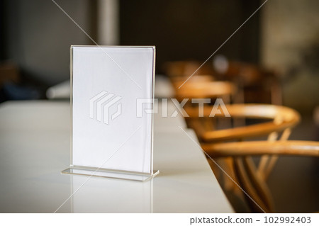 Stand Mock up Menu frame tent card blurred background design key visual layout in cafe 102992403