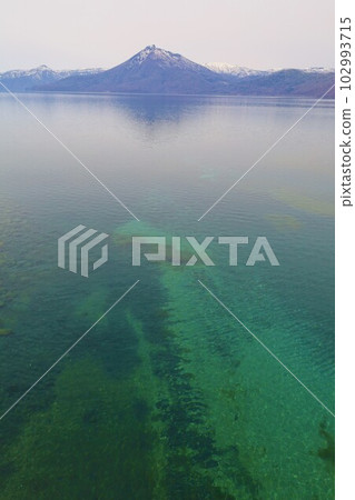 The view of Mirror Lake, Lake Shikotsu, Hokkaido in spring 102993715