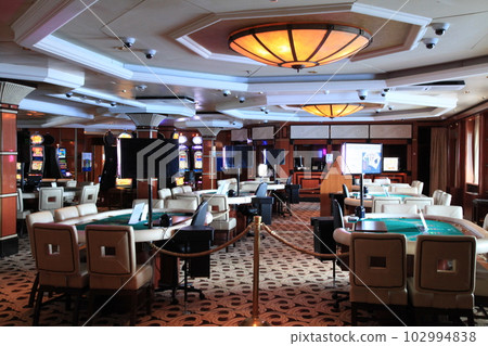 A casino gaming table onboard the cruise ship. A casino gaming table onboard the cruise ship. 102994838