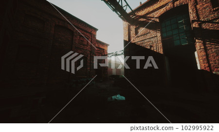Old abandoned industrial street view with brick facades 102995922