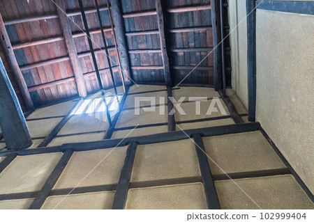 A smoke vent that doubles as a light in an old folk house A smoke vent that doubles as a light in an old folk house 102999404