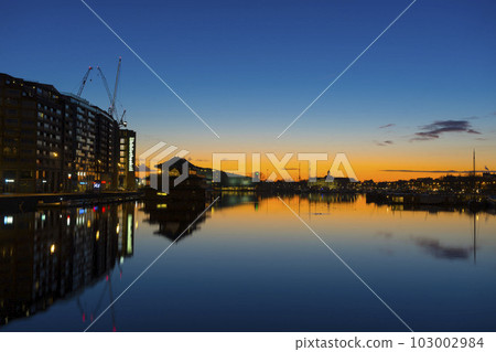 Amsterdam, Netherlands - Nov 30, 2019 : Beautiful sunrise view of NEMO Science Museum in Amsterdam, Netherlands on Nov 30, 2019. 103002984