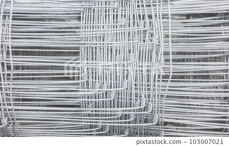Mesh wire bundle abstract background, selective focus. Mesh wire bundle abstract background, selective focus. 103007021