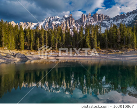 Lake landscape with mountain and forest Lake landscape with mountain and forest 103010867