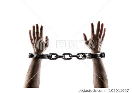 Shackled hands isolated on white background with clipping path Shackled hands isolated on white background with clipping path 103011667