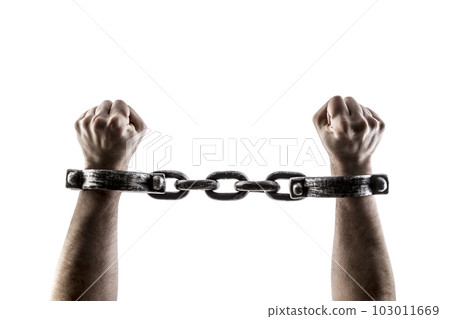 Shackled hands isolated on white background with clipping path Shackled hands isolated on white background with clipping path 103011669