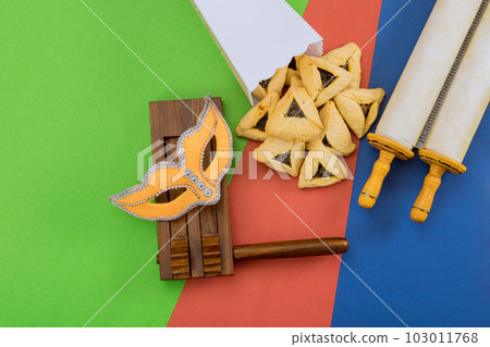 Jewish holiday of addition to hamantaschen other traditional foods eaten during Purim include kreplach cholent. 103011768