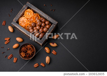 Roasted pecans and macadamia nuts, dried tangerine, dried berries 103012835