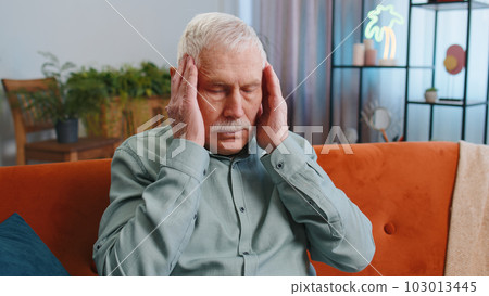 Displeased grandfather man rubbing temples to cure headache problem, suffering from migraine, stress Displeased grandfather man rubbing temples to cure headache problem, suffering from migraine, stress 103013445