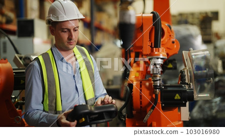 Professional male industrial engineer manager with safety uniform protection Professional male industrial engineer manager with safety uniform protection 103016980