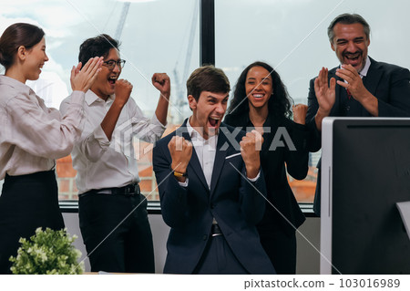 Happy business employees team celebrating success with praise in meeting room Happy business employees team celebrating success with praise in meeting room 103016989