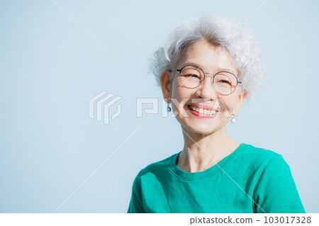 A woman with gray hair A woman with gray hair 103017328