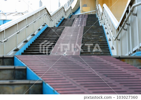 Stairs of a pedestrian overpass 103027360