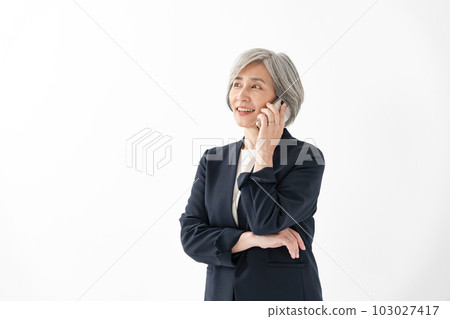 Senior woman with business smartphone 103027417