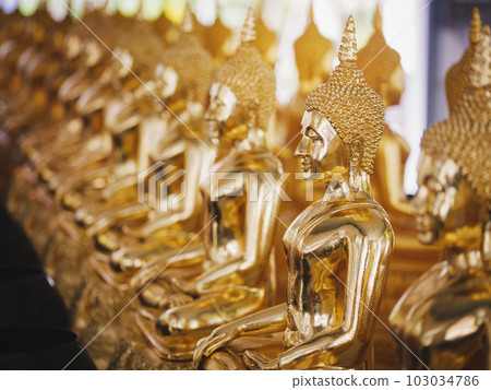 Golden Buddha Statue in temple Religion Asia culture Travel  103034786