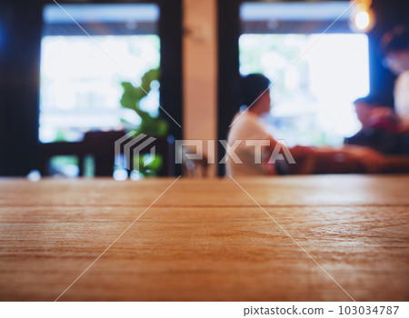 Table top Wooden counter bar Blur people on background Cafe restaurant Table top Wooden counter bar Blur people on background Cafe restaurant 103034787