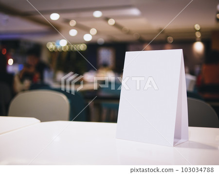 Mock up Menu frame on Table indoor Bar restaurant cafe Blur background Mock up Menu frame on Table indoor Bar restaurant cafe Blur background 103034788
