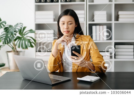 Woman Hand using tablet ,laptop, and holding mobile phone with credit card online banking payment communication network, internet application virtual icon . 103036044
