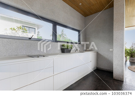 Outdoor kitchen stove and sink station near pool 103036374