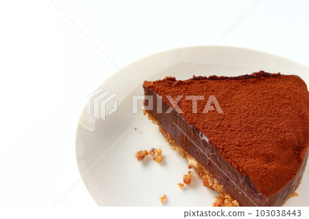 Raw chocolate tart made of cut cookie dough Raw chocolate tart made of cut cookie dough 103038443