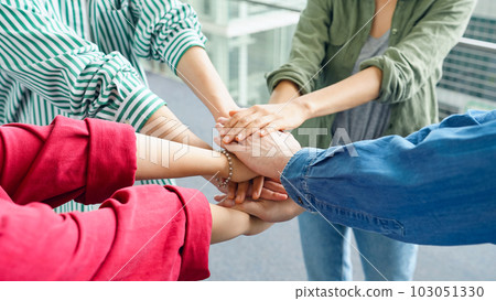 Multinational people forming a circle Teamwork image 103051330