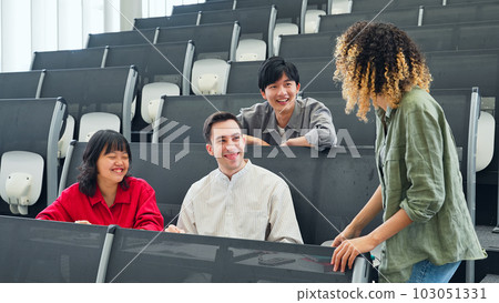 Group of multinational students having a conversation in a classroom 103051331