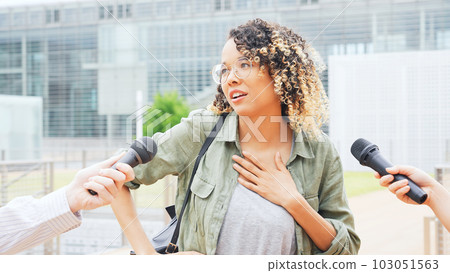 Foreign women being interviewed 103051563