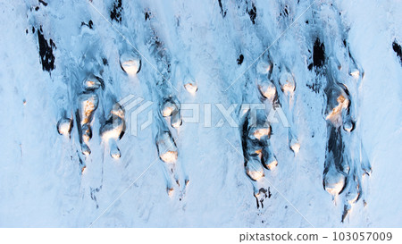 Winter Landscape in Iceland. Snow Covered Hills On The Ocean Shore. Abstract  103057009