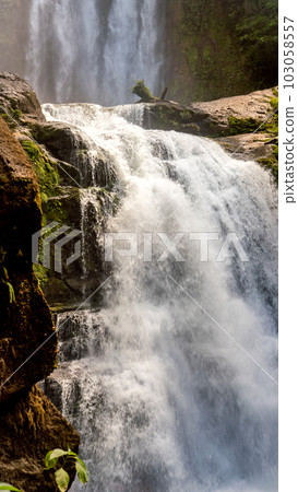 Close up of a waterfall in Costa Rica rainforest 103058557