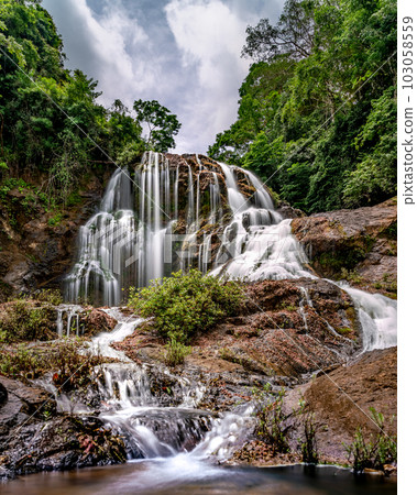 Long exposure of a waterfall in Costa Rica rainforest Long exposure of a waterfall in Costa Rica rainforest 103058559