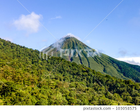 Landscape Panorama picture from Volcano Arenal next to the rainforest. Landscape Panorama picture from Volcano Arenal next to the rainforest. 103058575