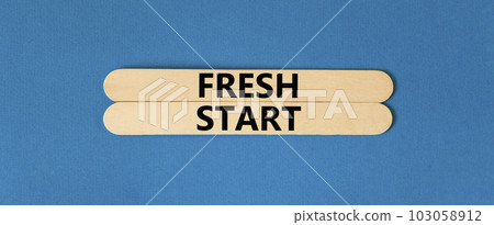 Fresh start and motivational symbol. Concept words Fresh start on beautiful wooden stick. Beautiful blue table blue background. Business motivational and Fresh start concept. Copy space. 103058912