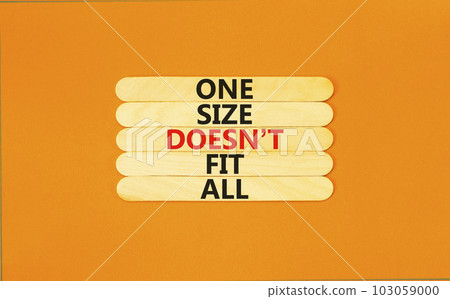 One size does not fit all symbol. Concept words One size does not fit all on wooden stick. Beautiful orange table orange background. One size does not fit all business concept. Copy space. One size does not fit all symbol. Concept words One size does not fit all on wooden stick. Beautiful orange table orange background. One size does not fit all business concept. Copy space. 103059000