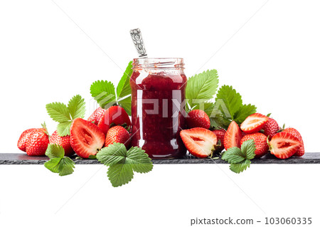 Strawberry jam and fresh berries are isolated on a white background. 103060335