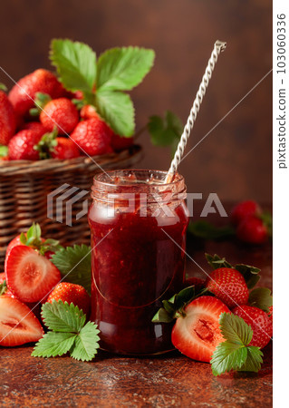Strawberry jam and fresh berries. 103060336