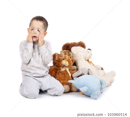 Funny little boy grimacing 103060514