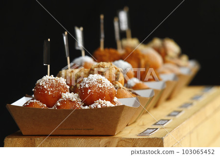 Deep fried dessert made from cottage cheese dumplings Deep fried dessert made from cottage cheese dumplings 103065452