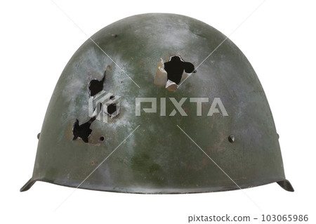 Russian invasion in Ukaraine 2022. Equipping mobilized - WW2 type russian army helmet with bullet holes. 103065986