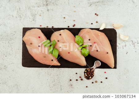 Raw fresh chicken fillet.Copy space.Food for retail.Ogranic food,healthy eating.Food concept.Top view.Chicken breast Fillets.Close up.Raw chicken meat. Raw fresh chicken fillet.Copy space.Food for retail.Ogranic food,healthy eating.Food concept.Top view.Chicken breast Fillets.Close up.Raw chicken meat. 103067134